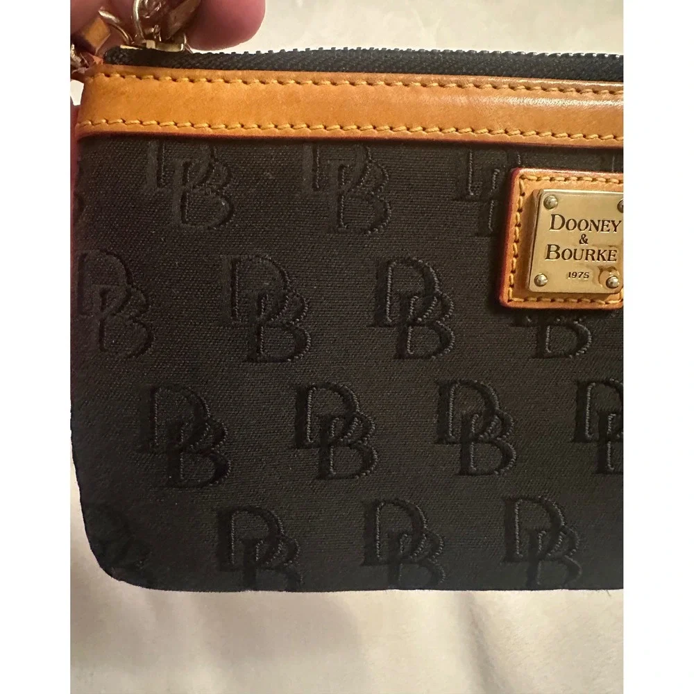 Dooney & Bourke Black Monogram Canvas Wristlet Pouch Tan Leather Trim Red Lining